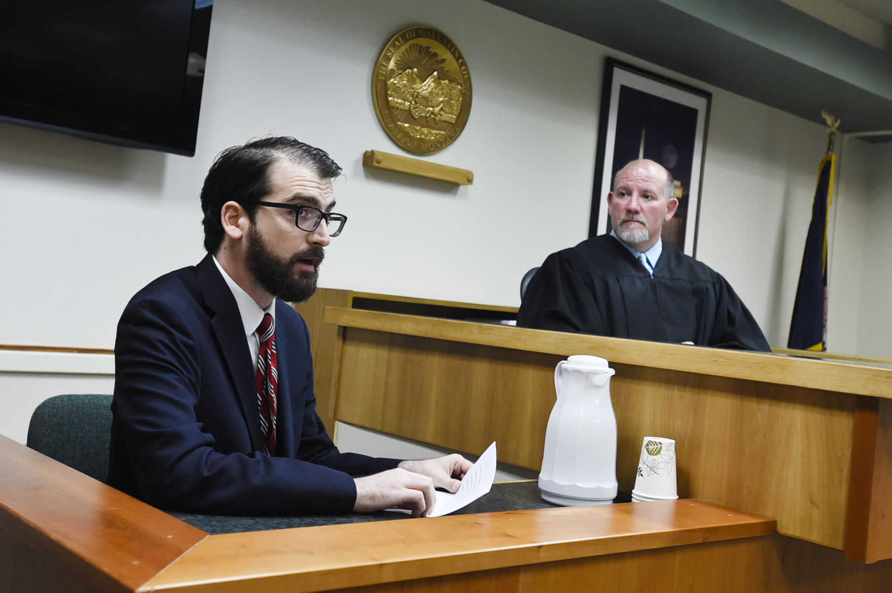 Guardian reporter Ben Jacobs reads from a statement Monday morning in the Gallatin County Courthouse.